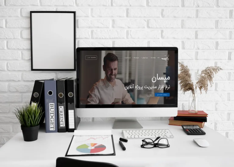 front-view-office-desk-with-computer-screen-glasses (1)